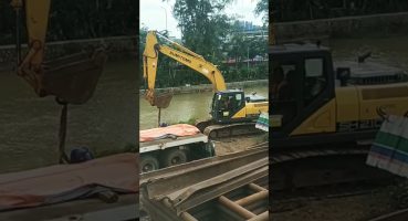 Lifting steel sheet pile with Sumitomo SH 200 excavator to trailer truck part 6 #shorts #excavator Fragman izle